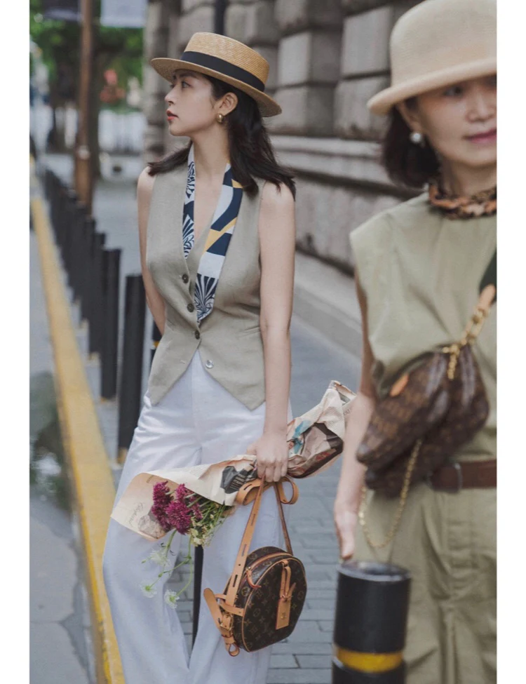 Круглая сумка LV