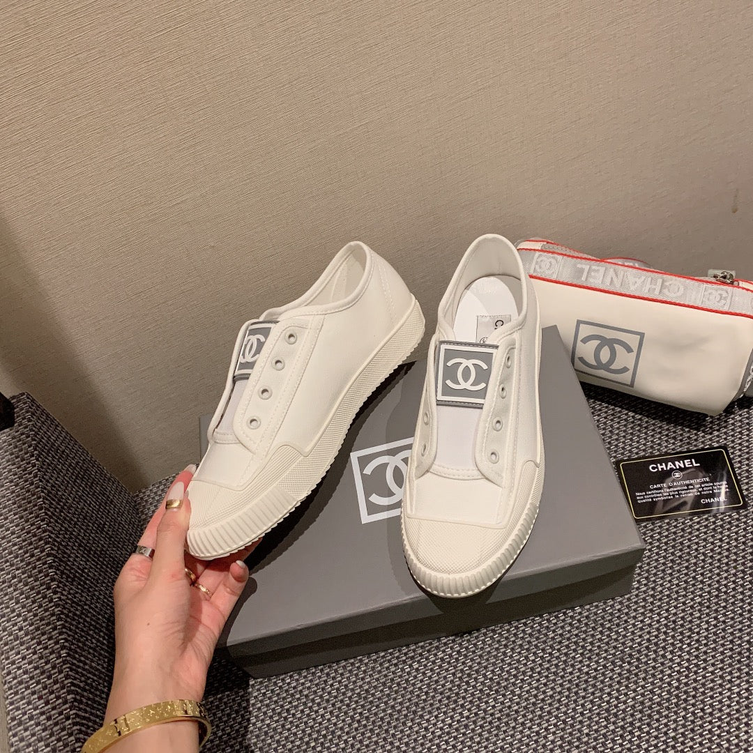 Винтажные парусиновые туфли Chanel - белые