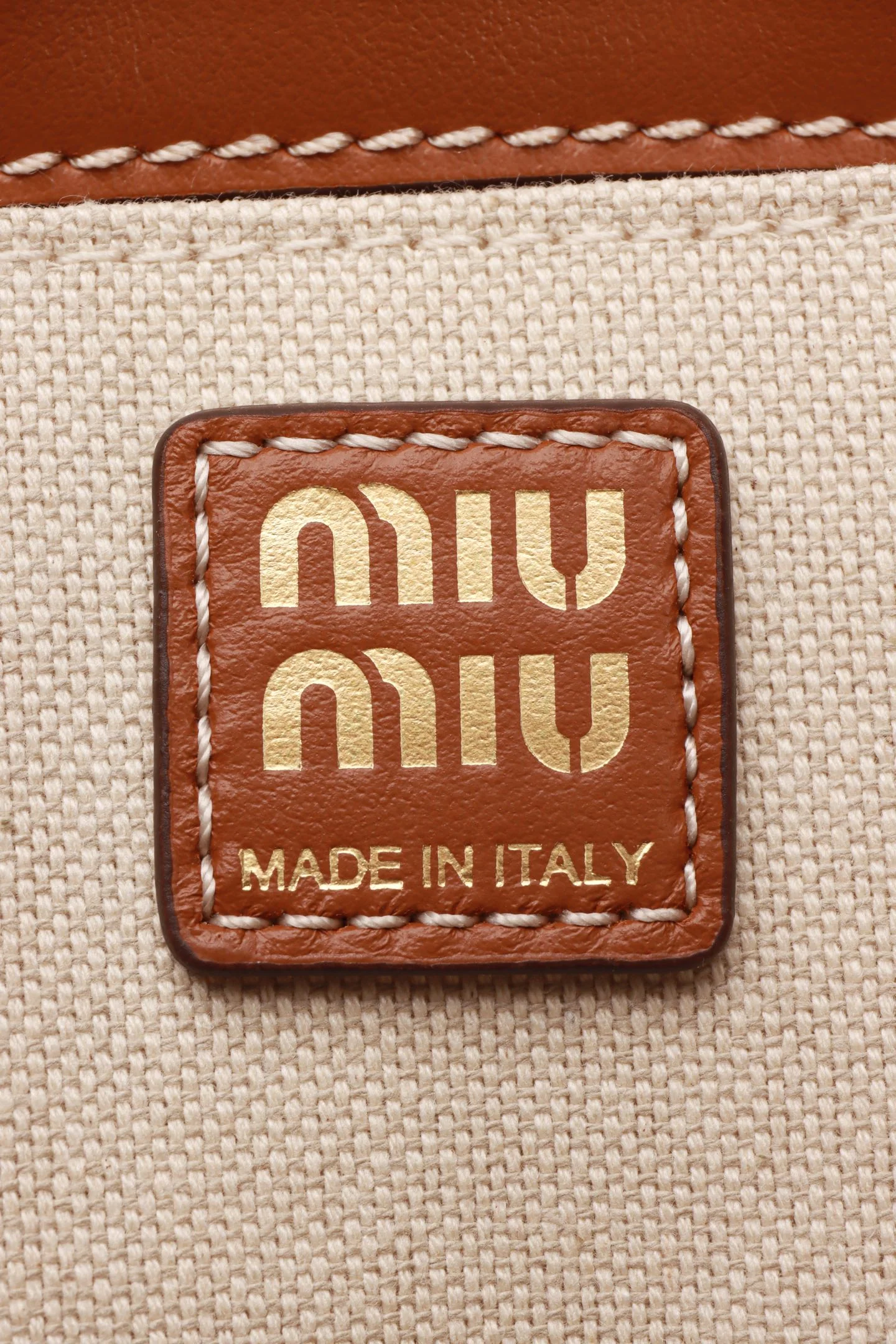 Рюкзак Miu Miu из канваса и кожи, маленький, коньячный.