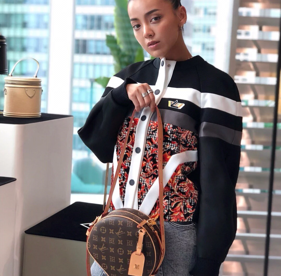 Круглая сумка LV