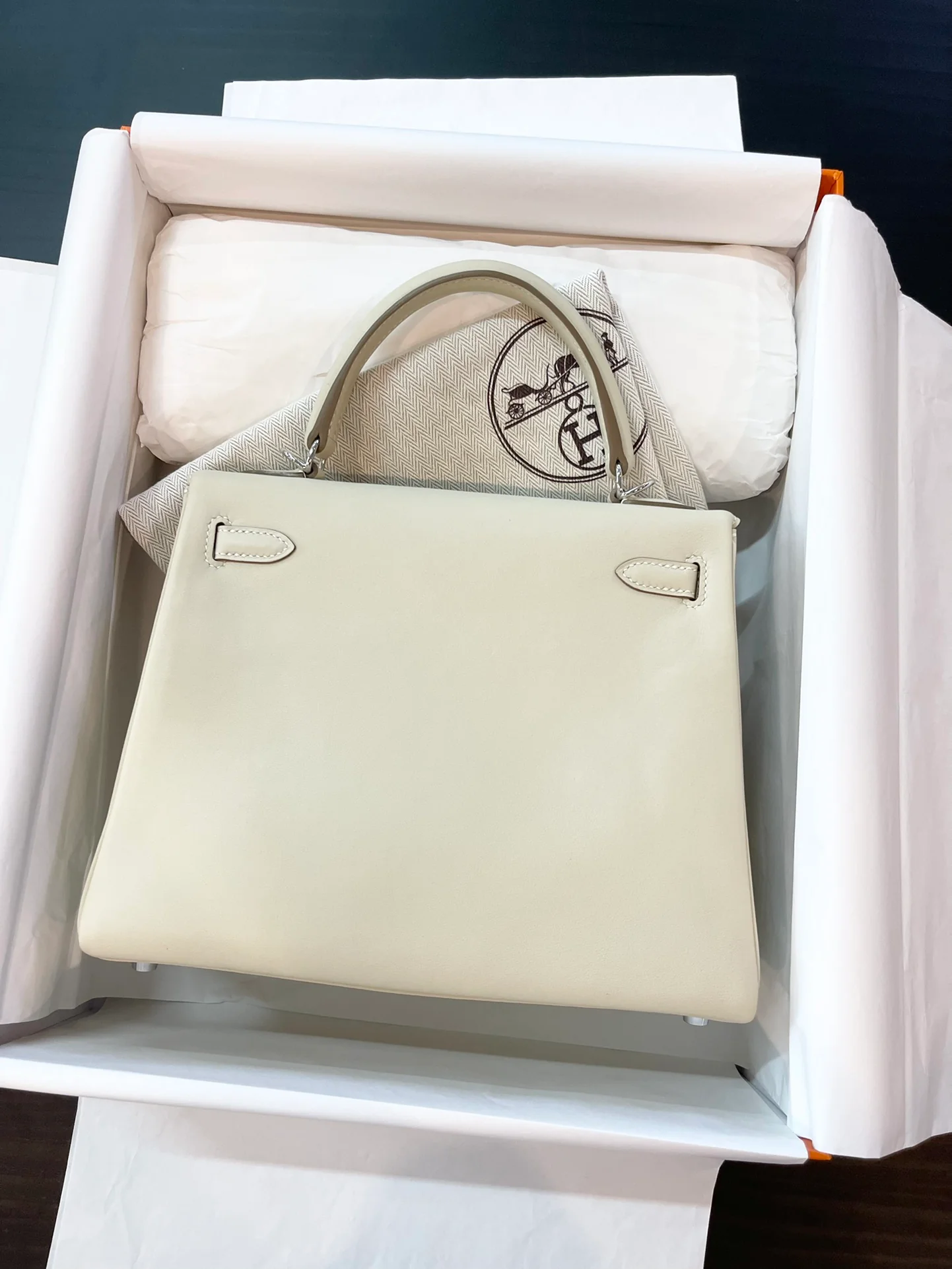 Hermes Kelly 25 Swift Milkshake White Silver Buckle