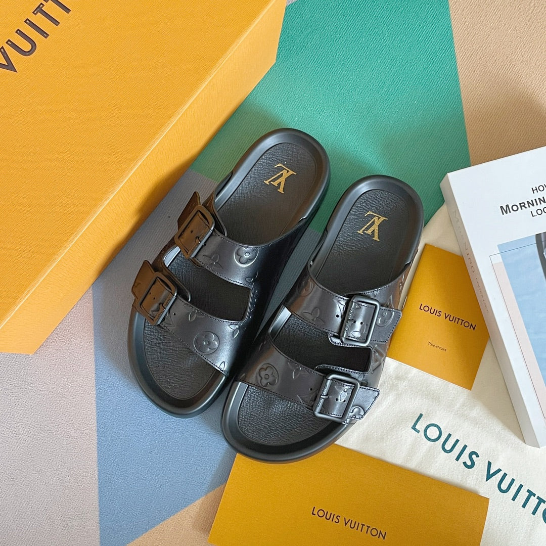 Новые кроссовки LV из серии 2023 года с тисненым монограммом — черные.