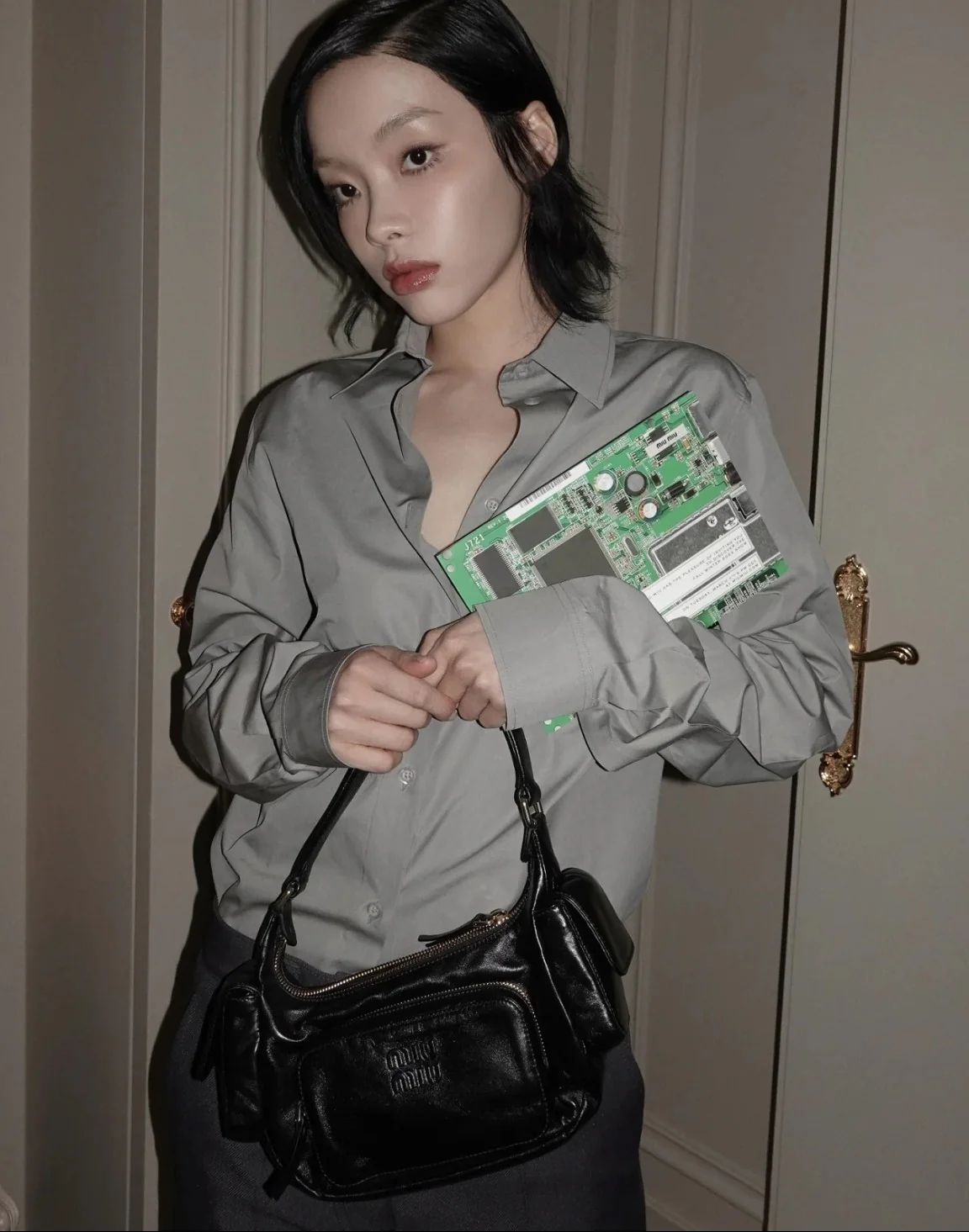 Сумка-клатч Miu Miu из кожи наппа — черная