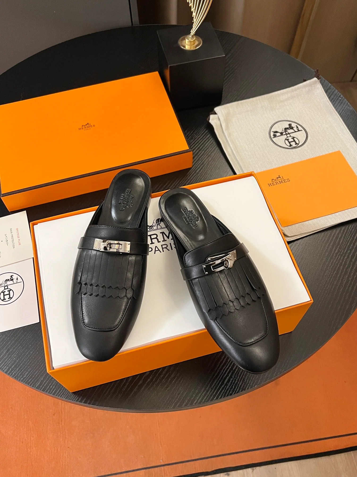 Мюли Hermes Kelly Slip-on 2024 года - черные - 1