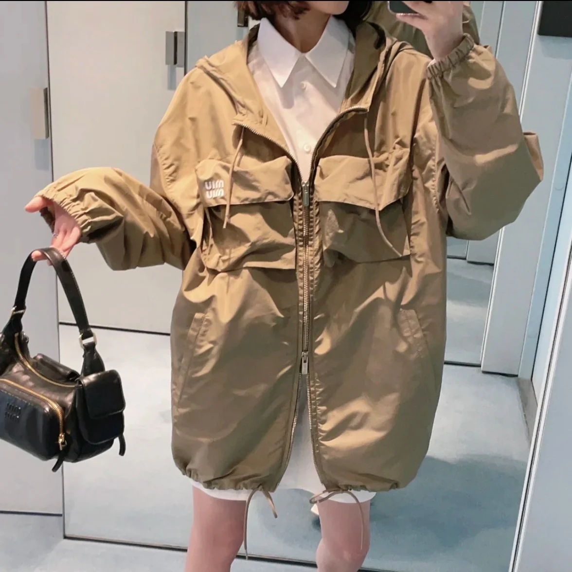 Сумка-клатч Miu Miu из кожи наппа — черная