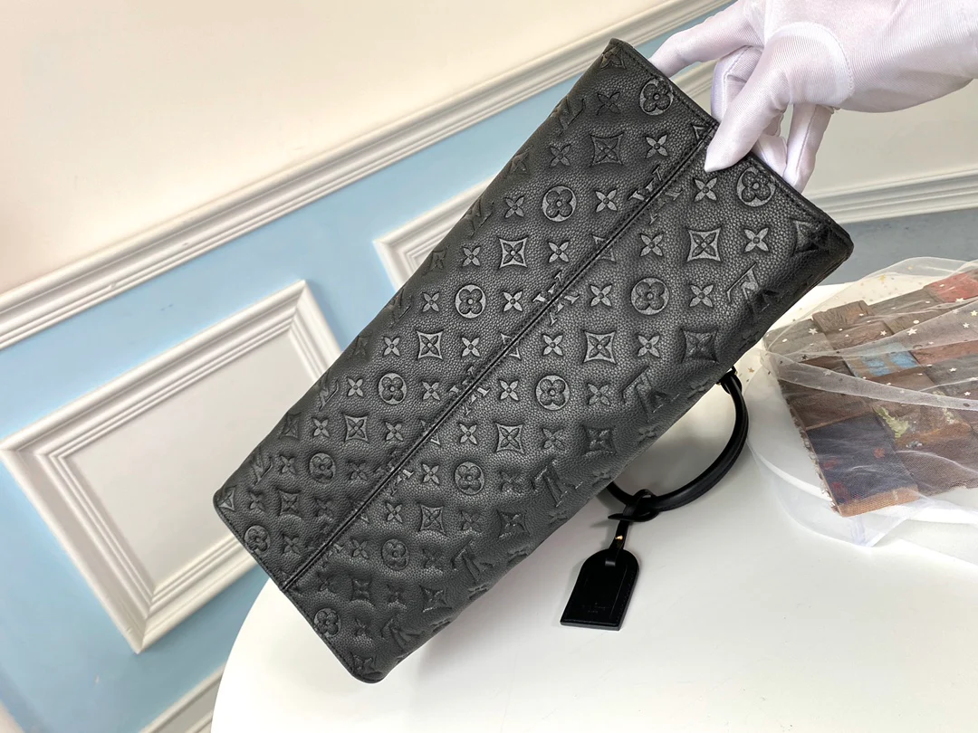 lv-m44925-black embossed-onthego-handbag