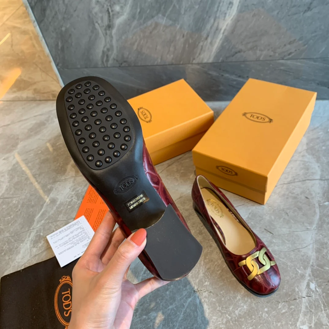 Туфли на низком каблуке Tods