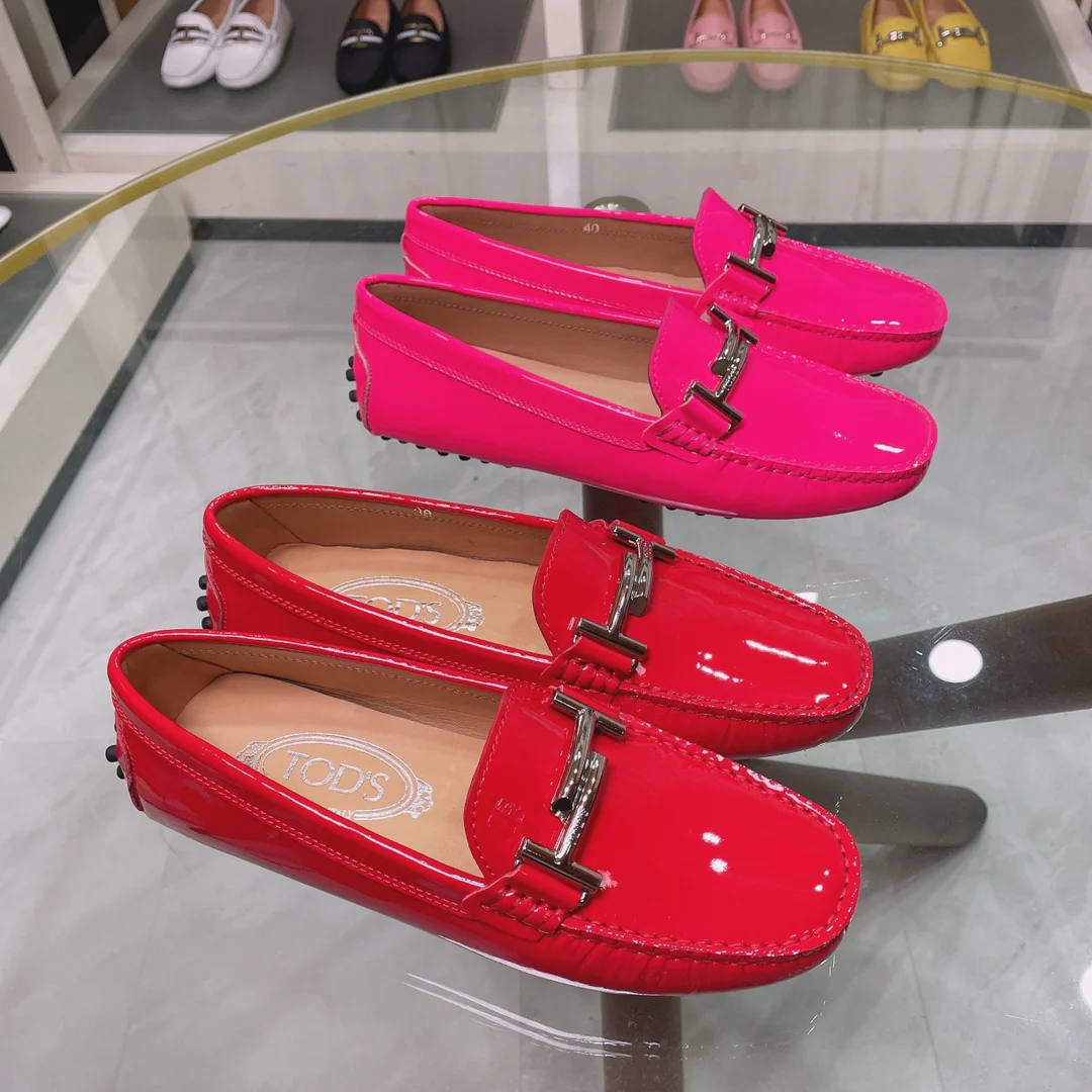 Лоферы/слипоны Tods Double T из лакированной кожи