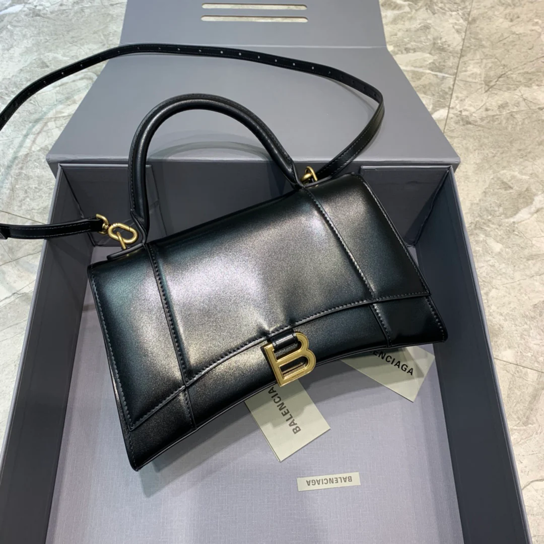 Сумка Balenciaga Hourglass, средний размер, черная, однотонная кожа.