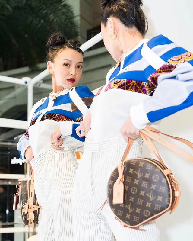 Круглая сумка LV