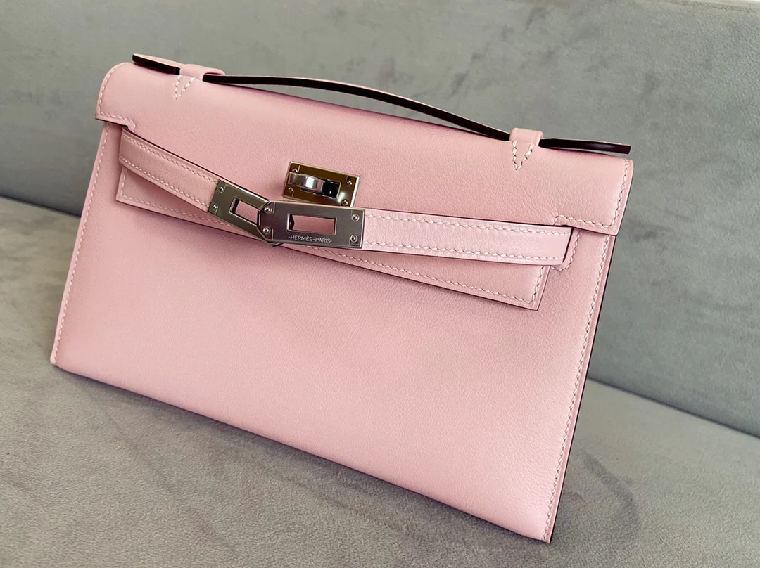 Мини-сумка Hermes Kelly 1-го поколения, 22 см, из кожи Swift, цвет Sakura Pink, серебряная пряжка.
