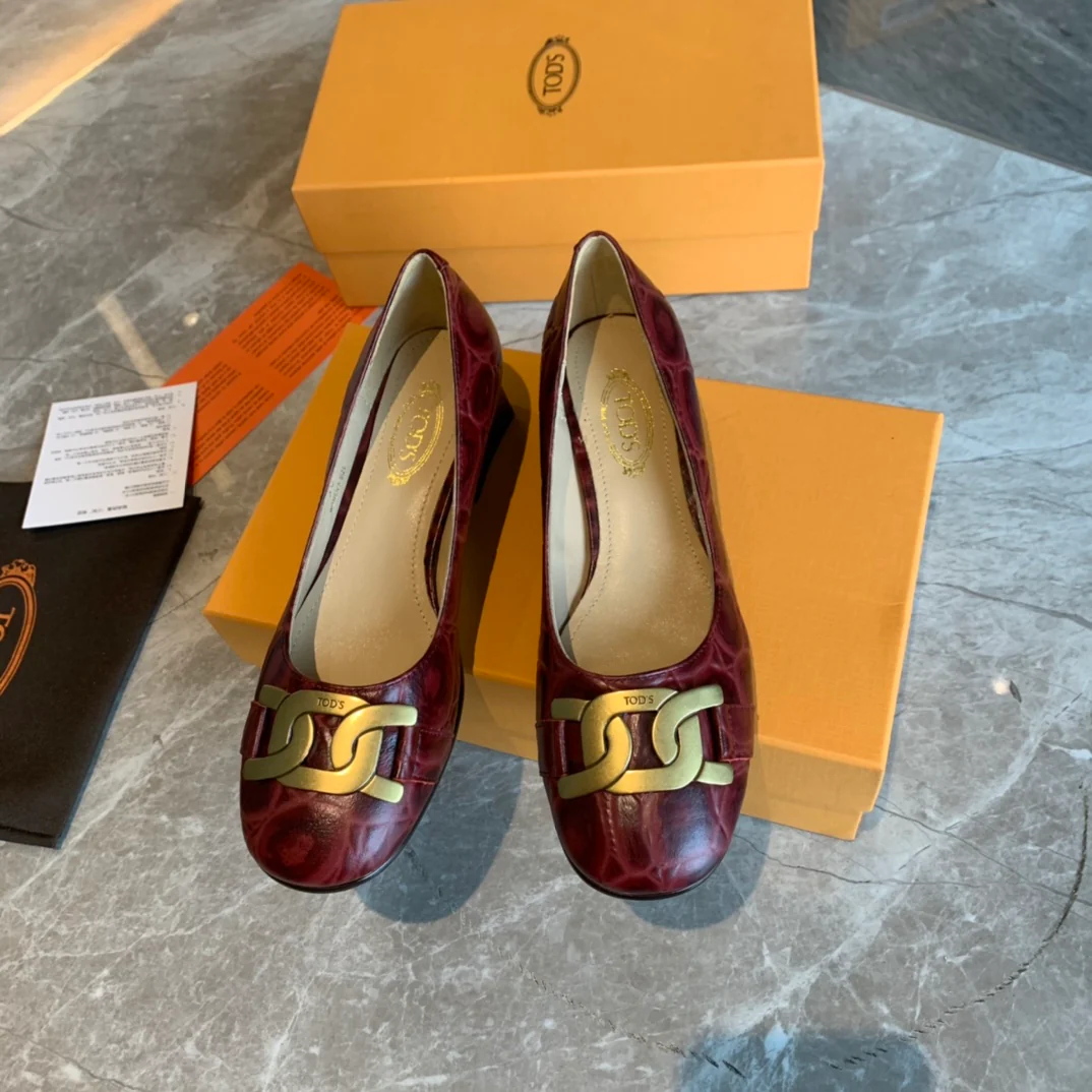 Туфли на низком каблуке Tods