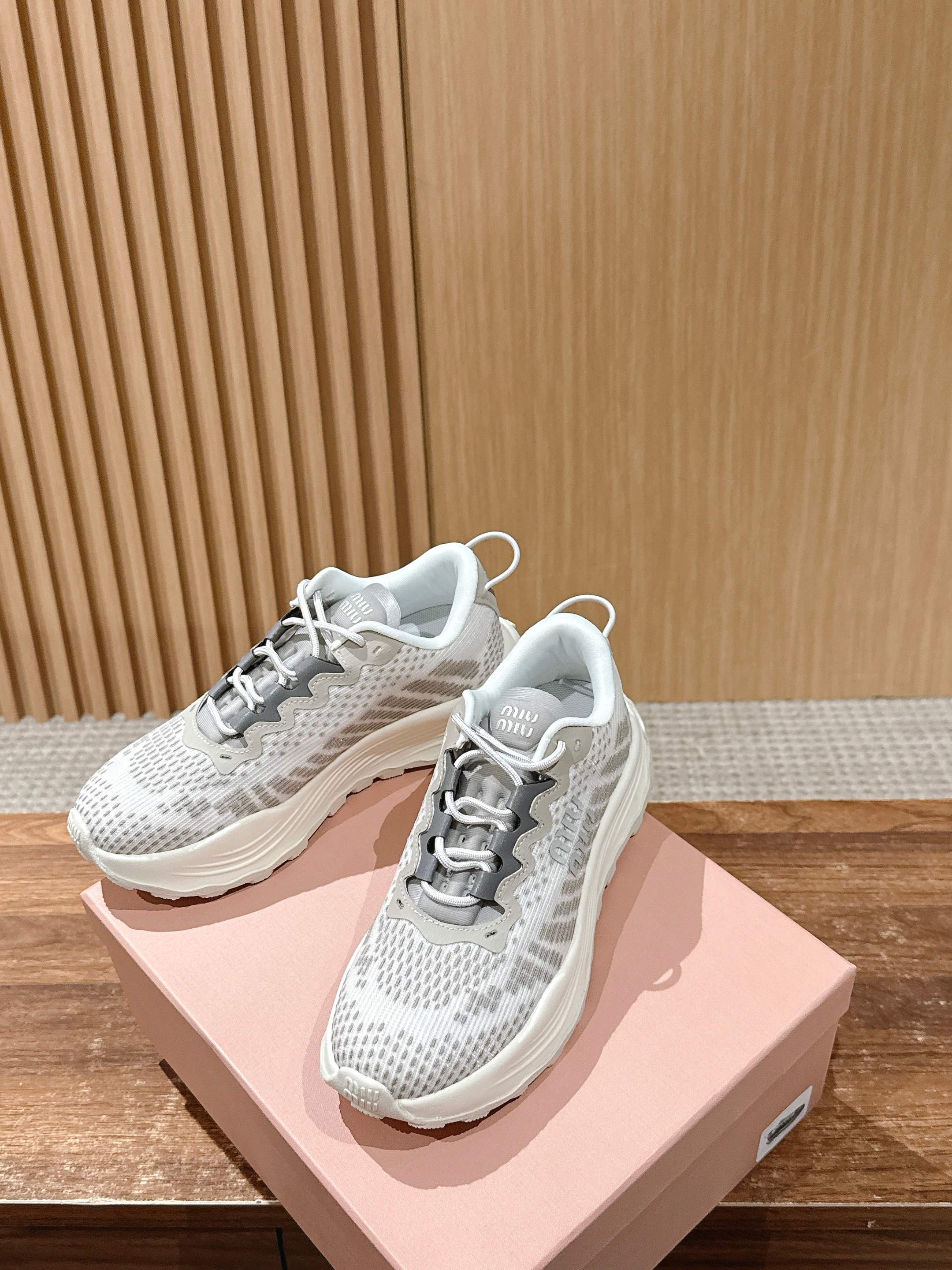 Кроссовки на платформе Miu Miu - серые