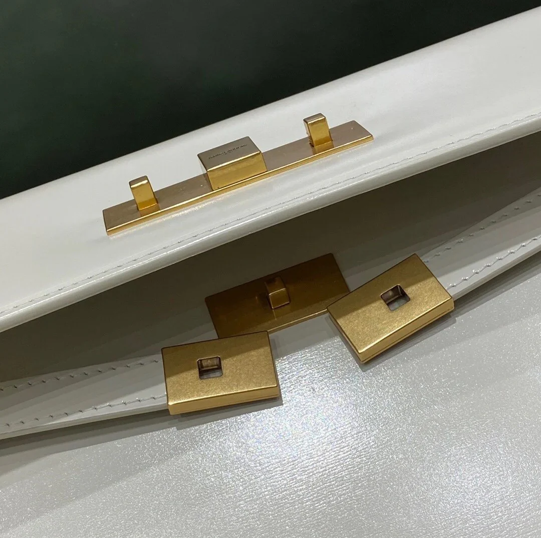 Зубочистка YSL Manhattan, большая, белая.