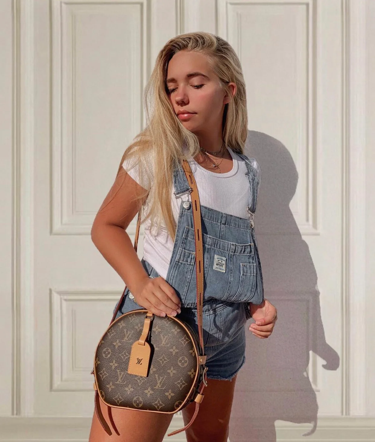 Круглая сумка LV