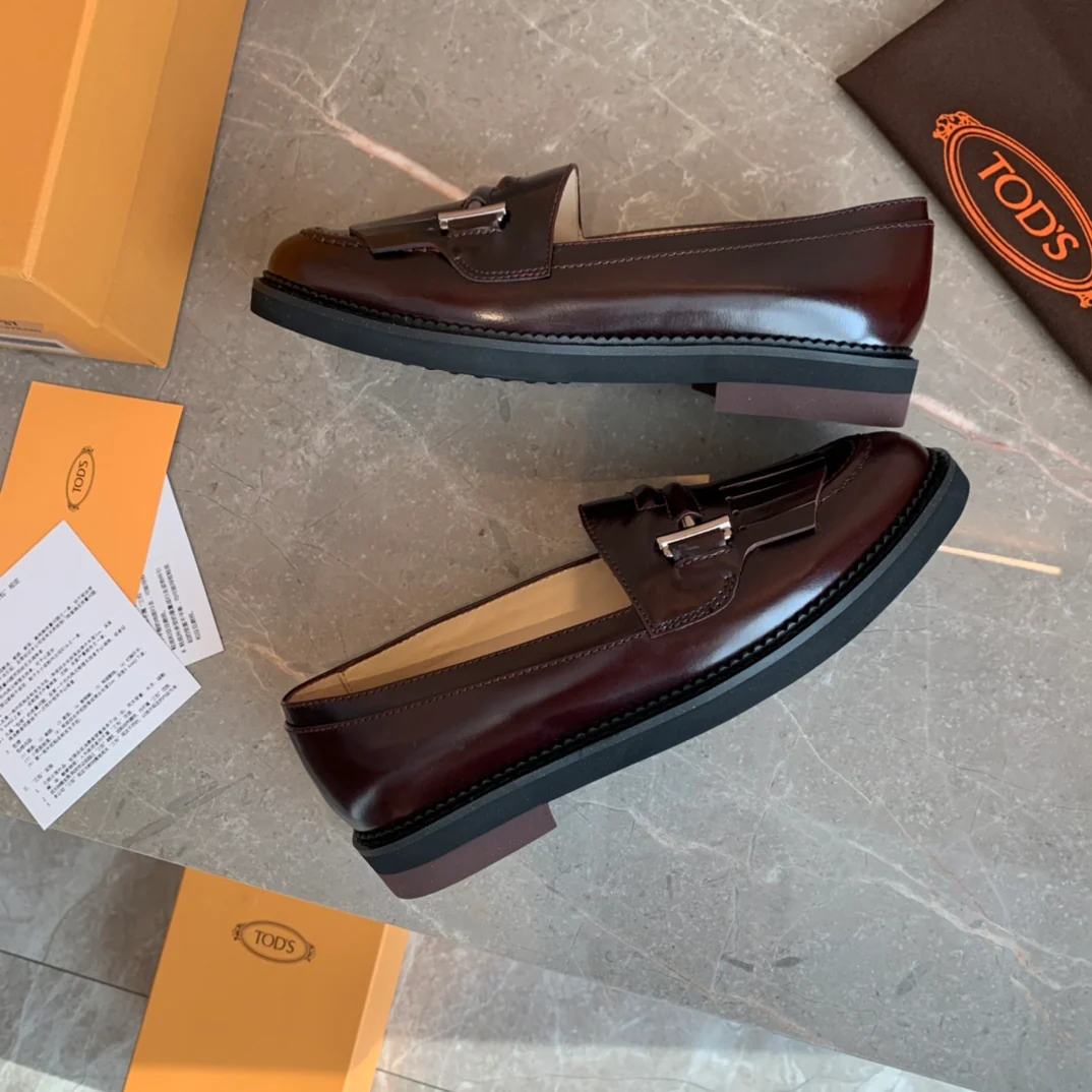 Лоферы Tods Double T с кисточками