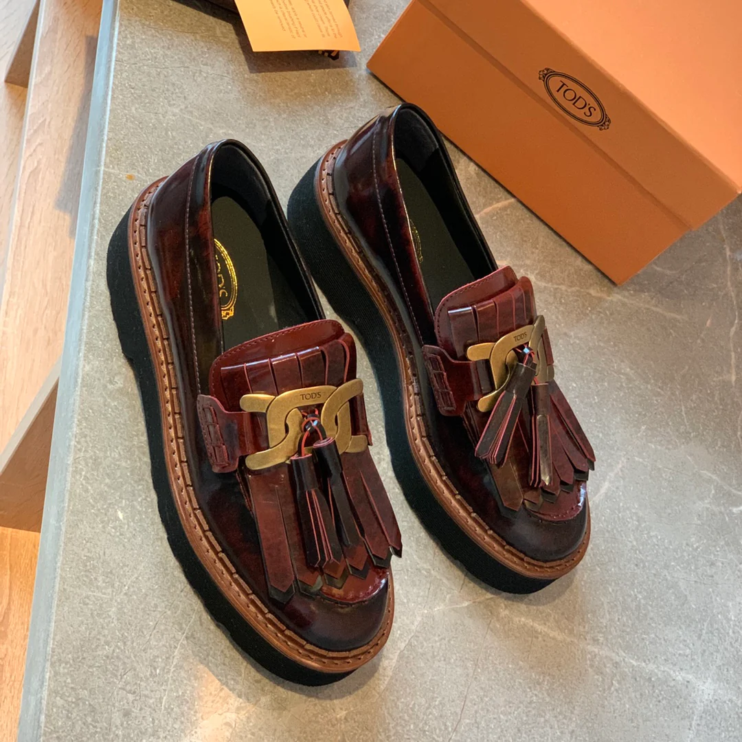 Лоферы Tods на платформе с кисточками - 1