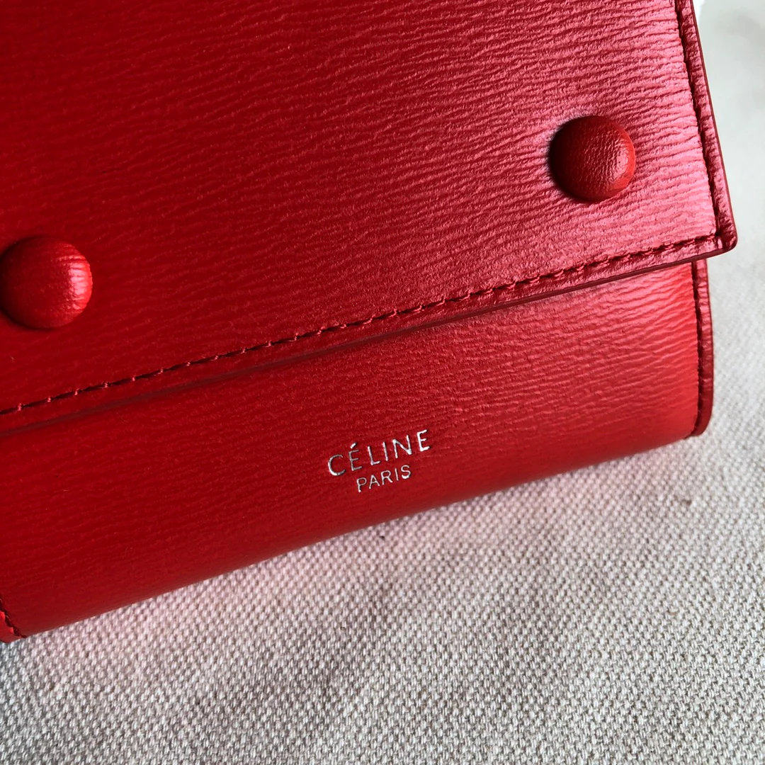 Короткий трехсекционный кошелек Celine с узором ?Красная рябь на воде?.