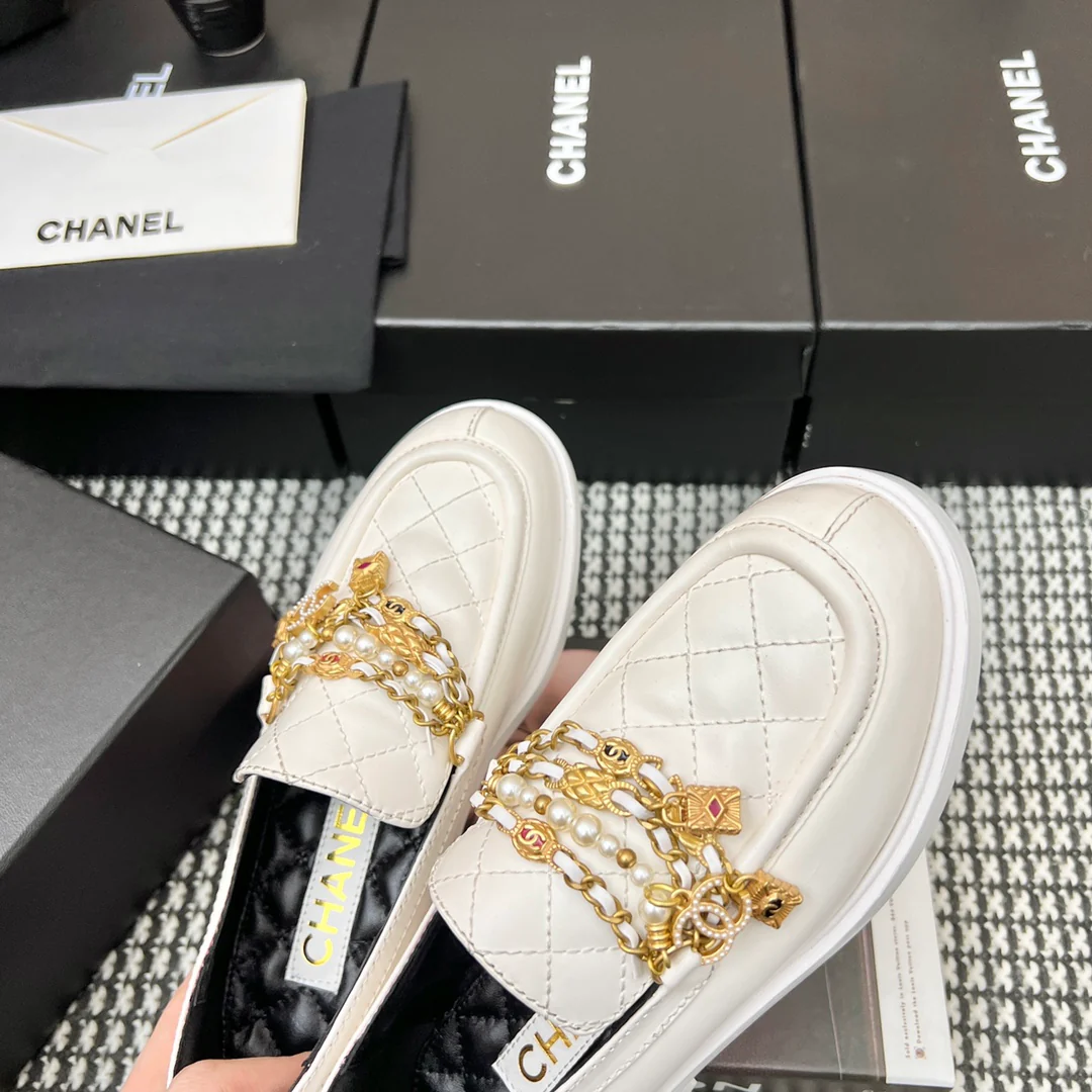 Туфли-балетки Chanel в афро-стиле