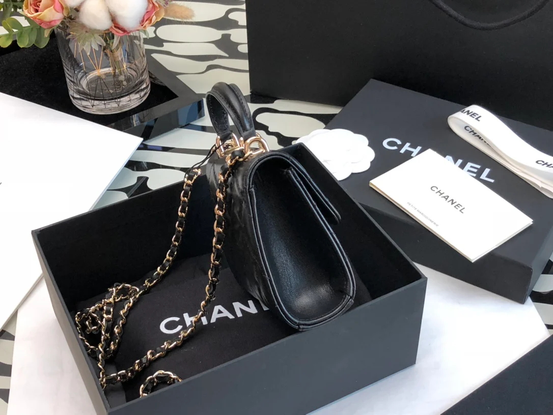 Мини-сумочка Chanel с ручкой - черная