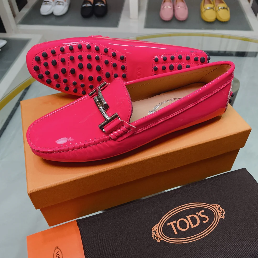 Лоферы/слипоны Tods Double T из лакированной кожи