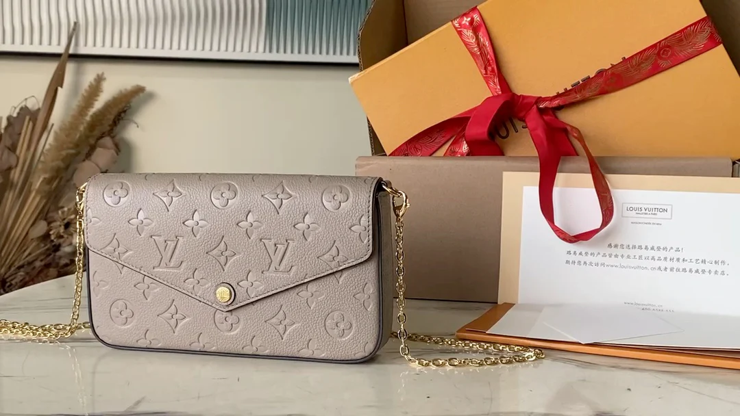 m82609-LV-pochette-felicie-embossed calfskin-milk tea color