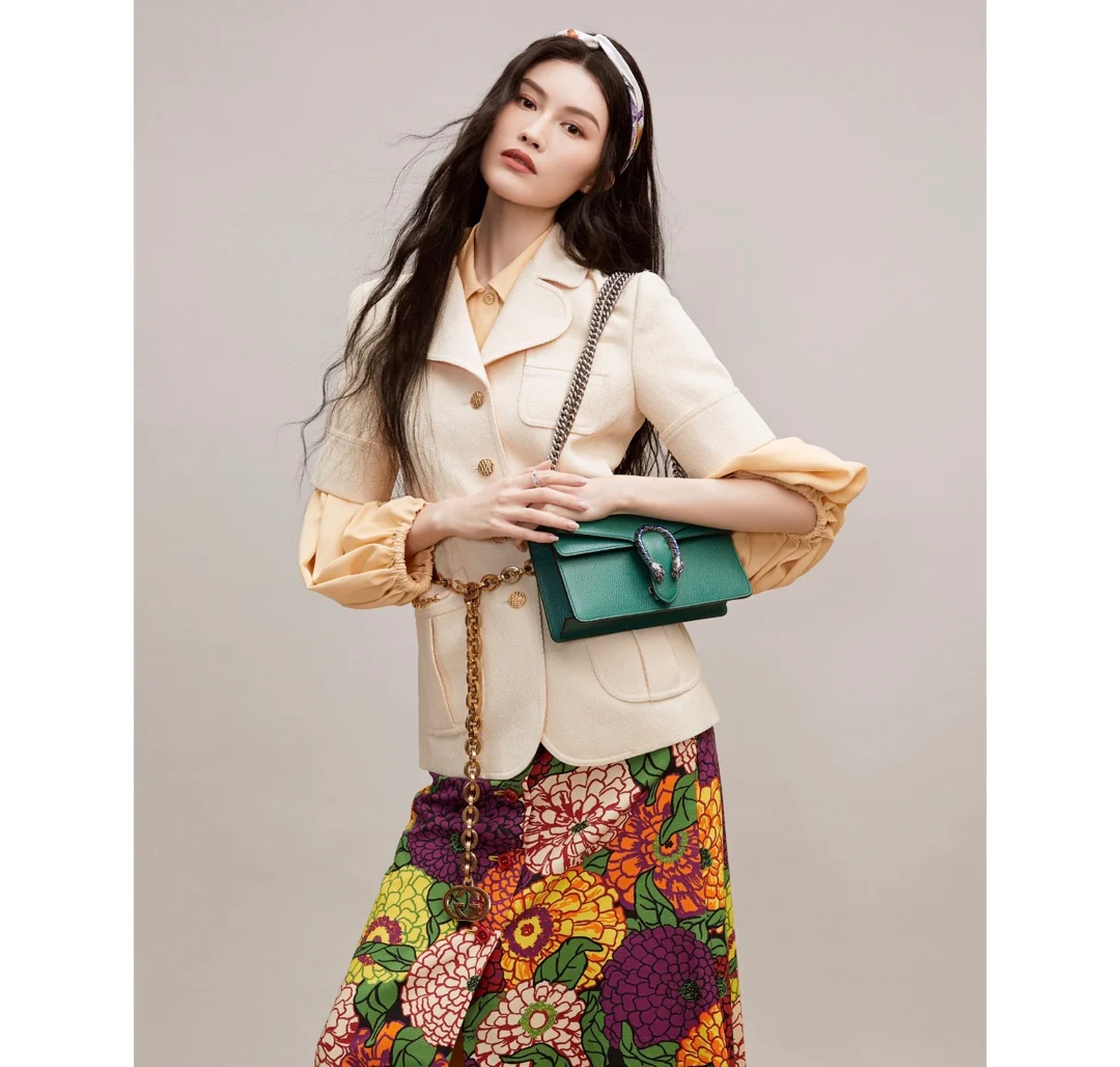 Сумка Gucci Dionysus зеленого цвета с зернистой текстурой.