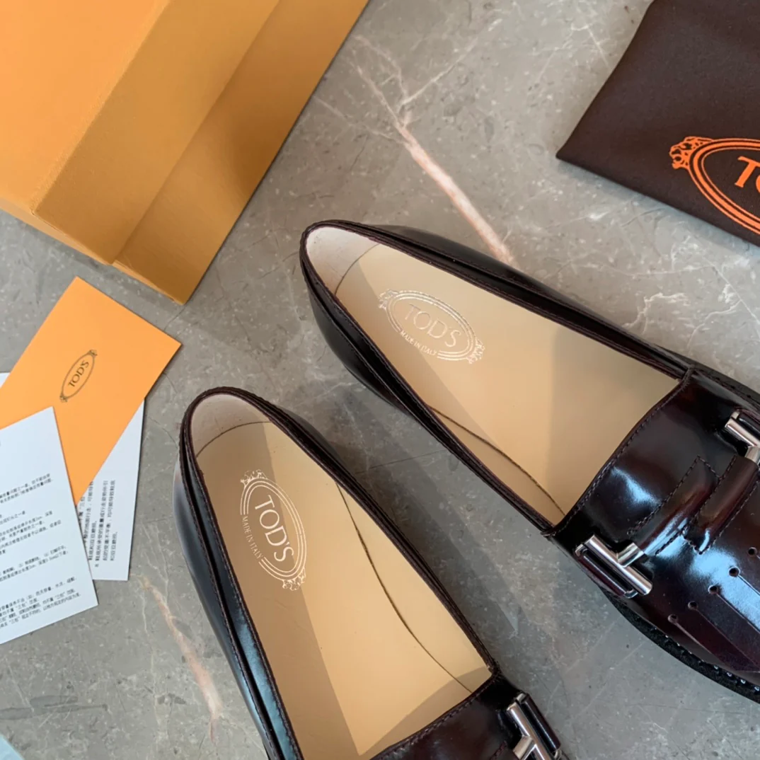 Лоферы Tods Double T с кисточками