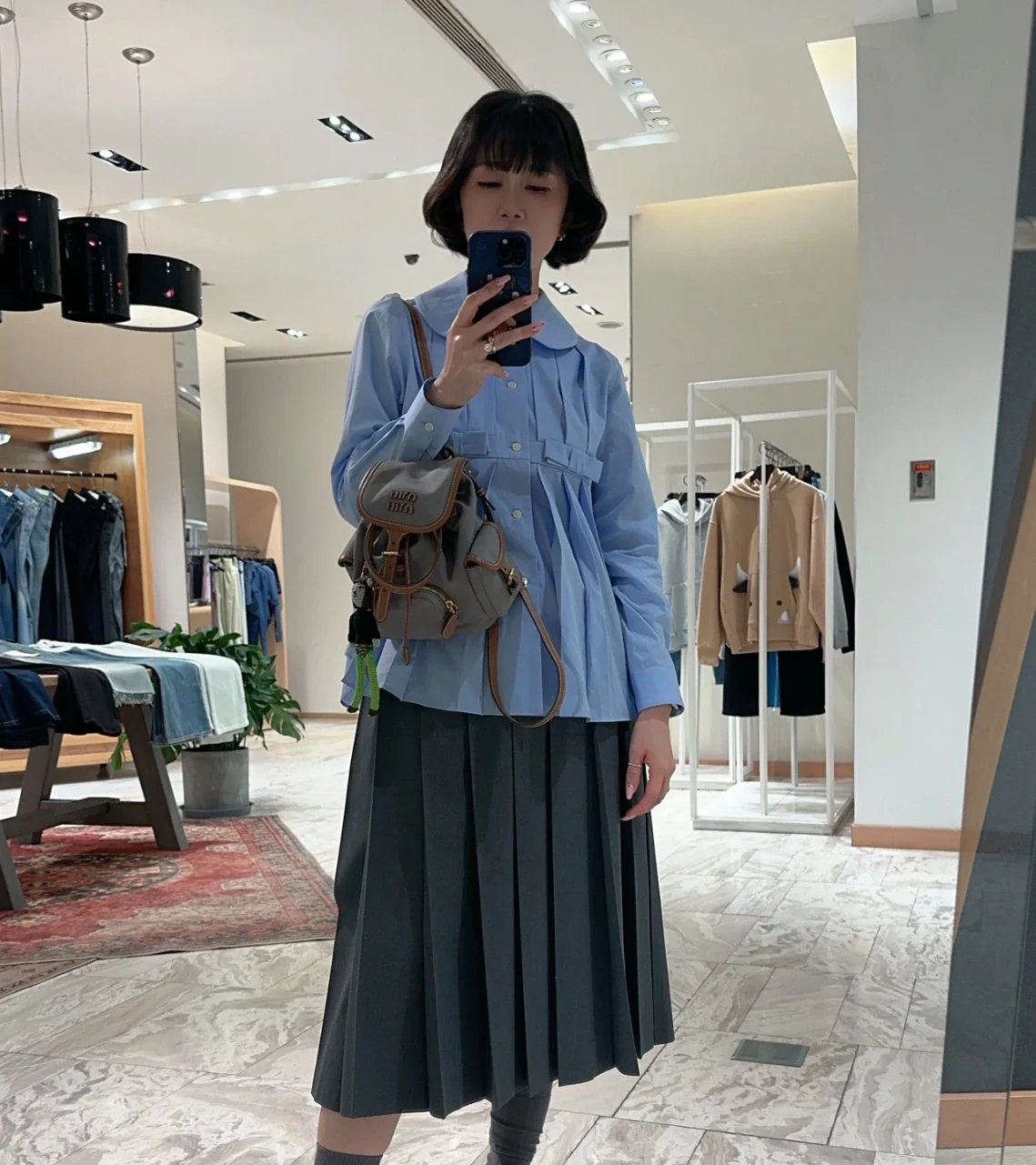 Рюкзак Miu Miu из канваса и кожи, размер S, серый (на фото).