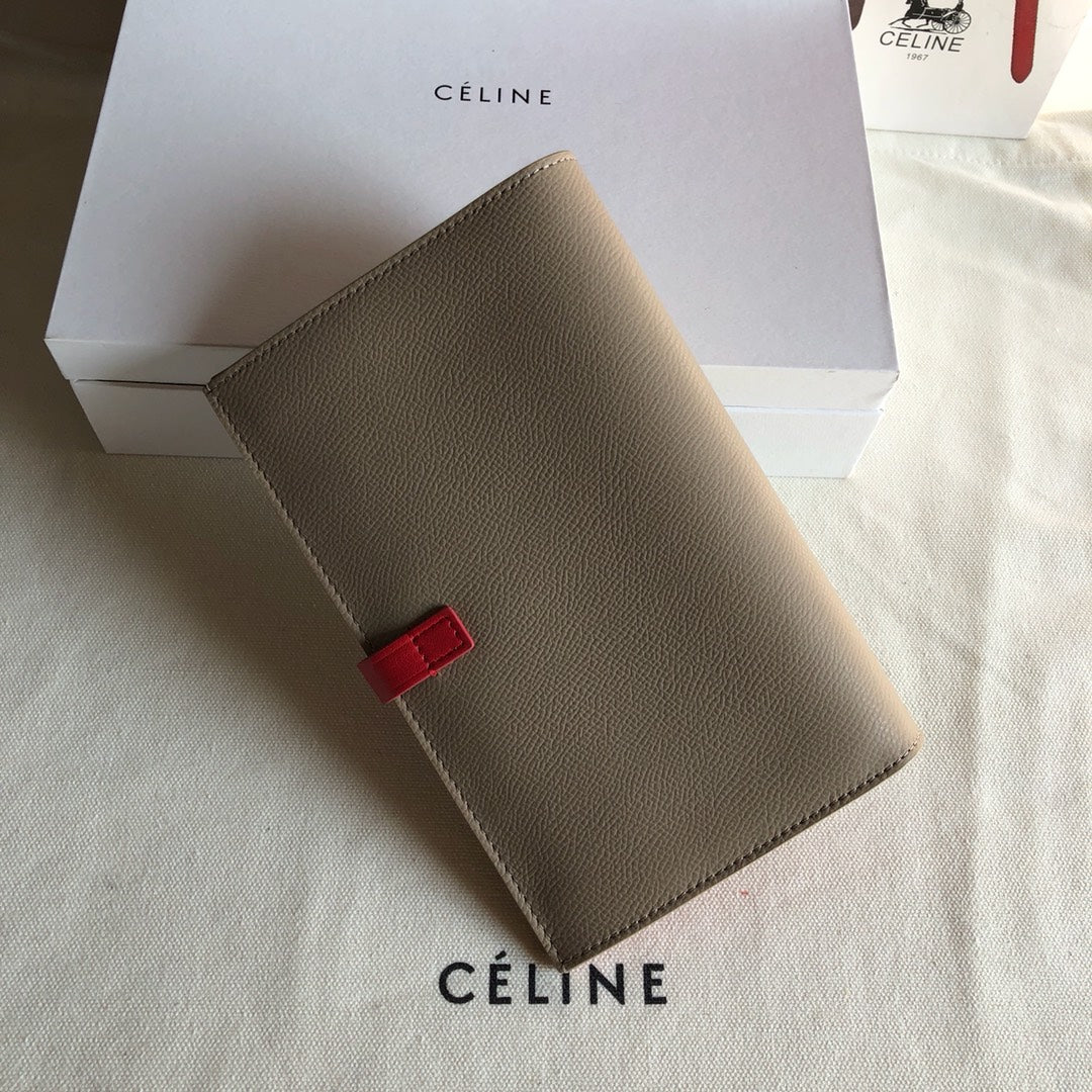 Длинный кошелек Celine — абрикосовый и фуксия — с принтом пальм.