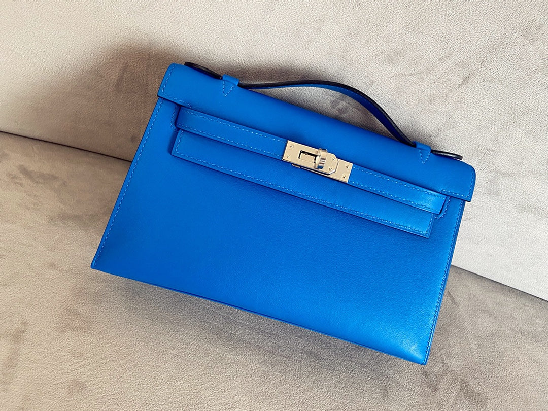 Мини-сумка Hermes Kelly 1-го поколения, 22 см, кожа Swift, ширина 17 мм, цвет лазурит, серебряная пряжка.