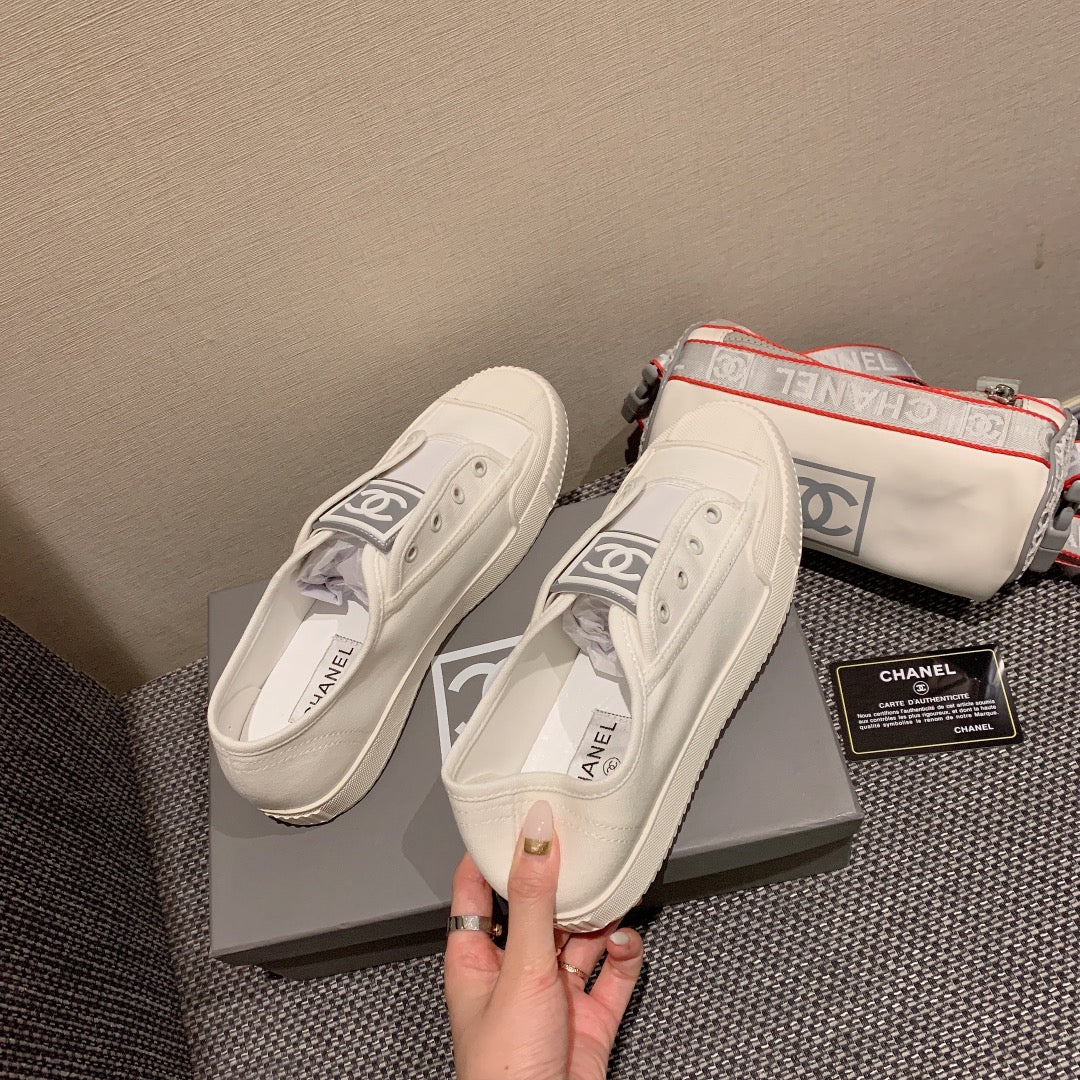 Винтажные парусиновые туфли Chanel - белые