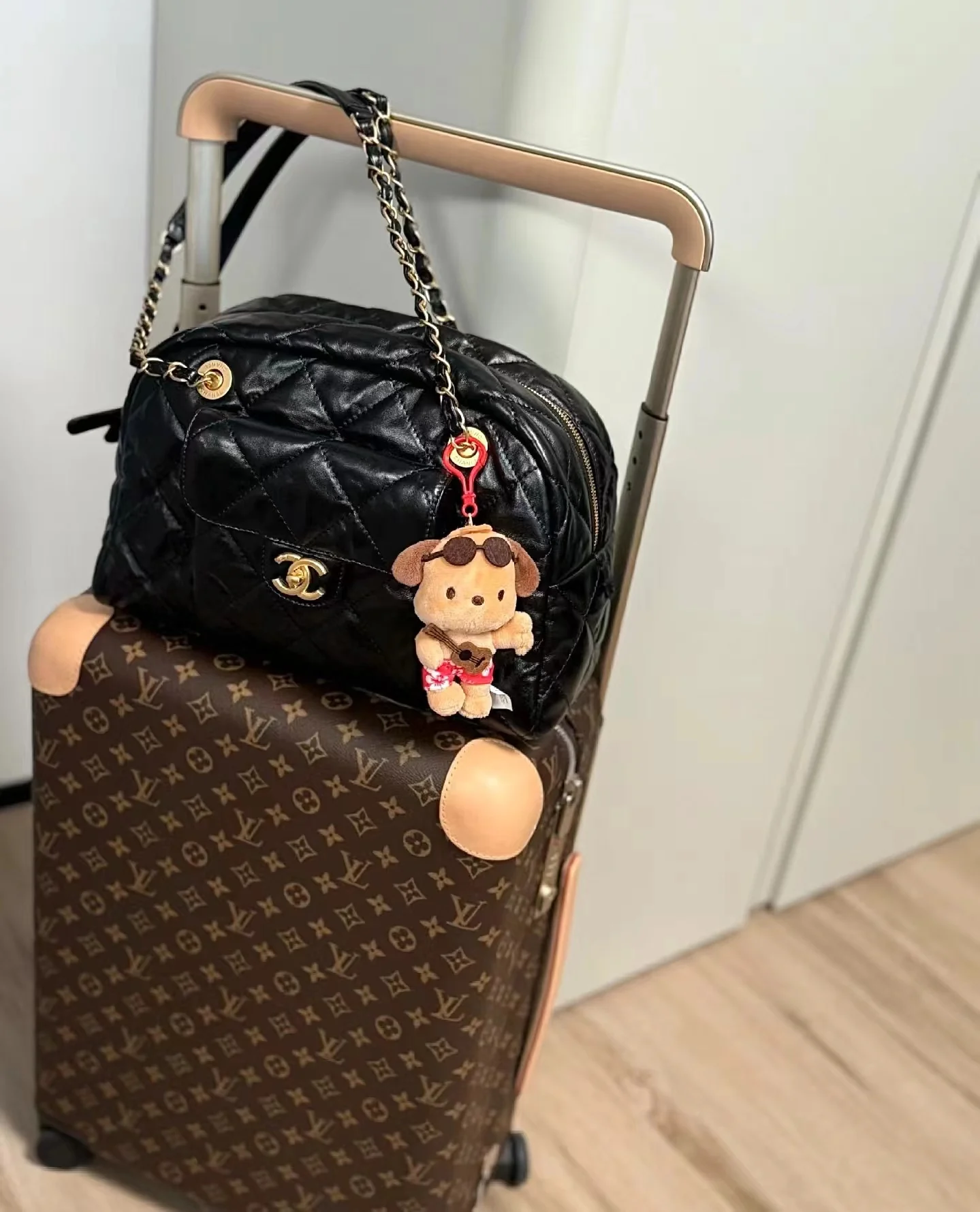 Маленькая сумка-боулинг Chanel 24a - черная