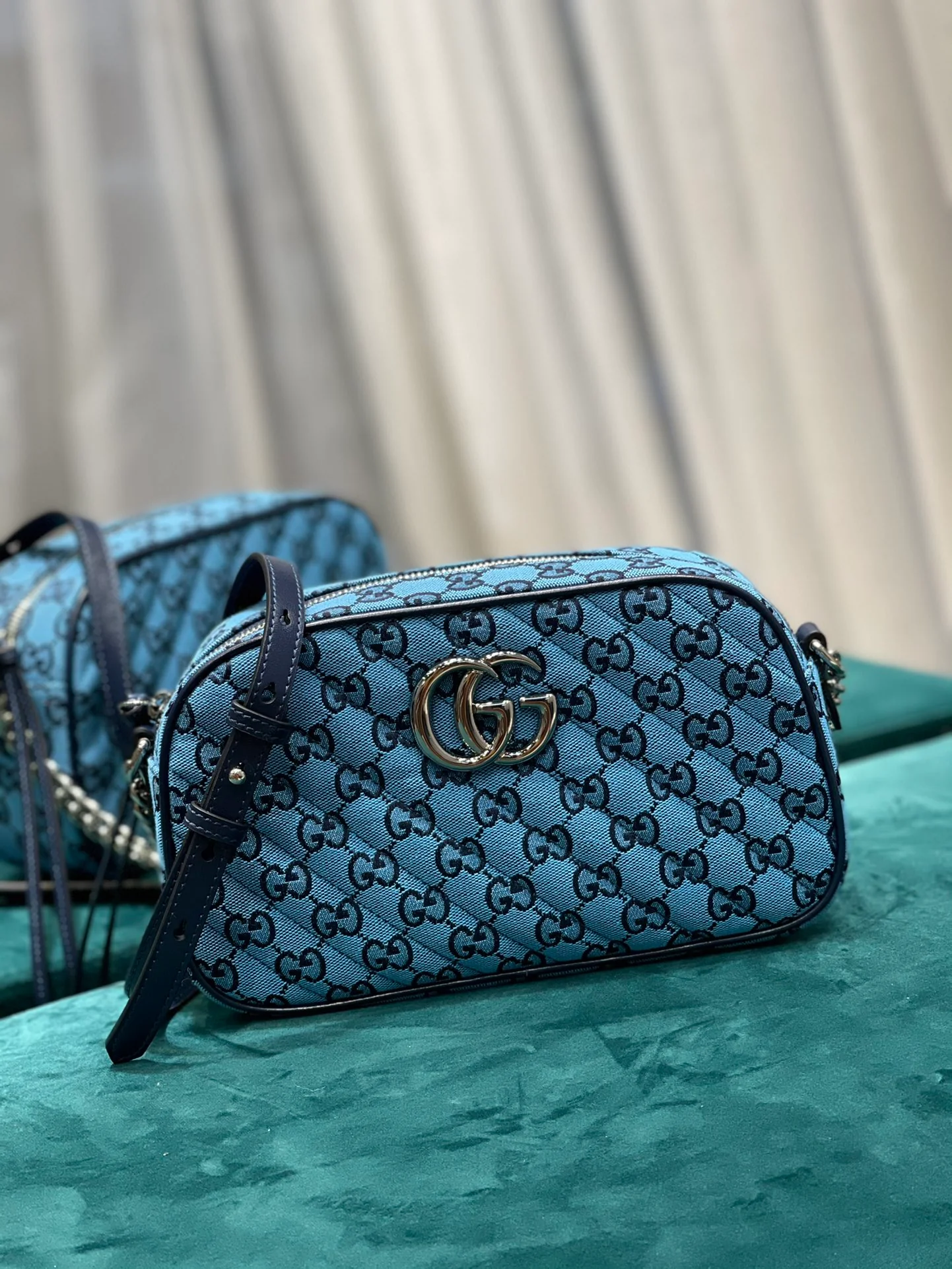 Изображение коллекции сумок для фотоаппаратов Gucci Marmont