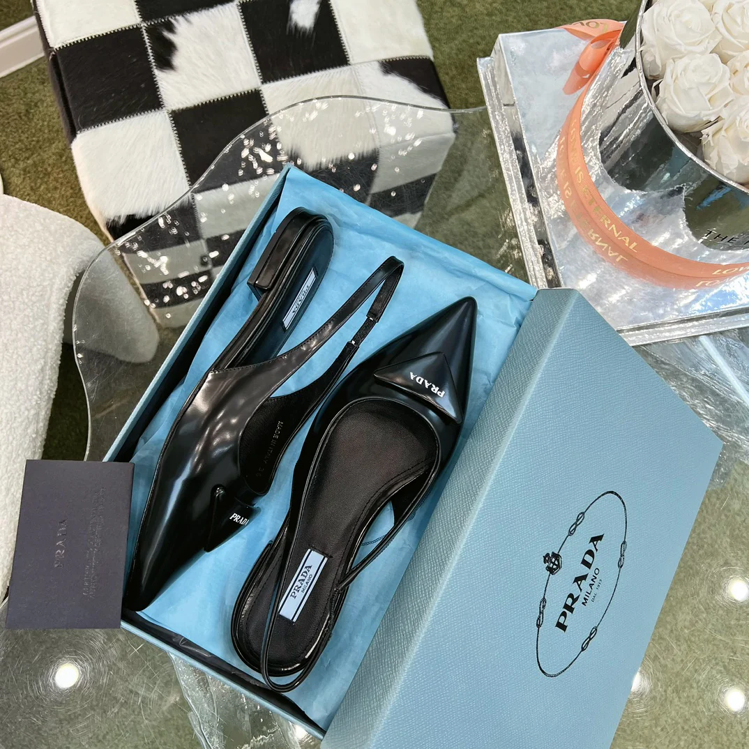 Prada Весна/Лето 2023 - Мюли с острым носком - Черные