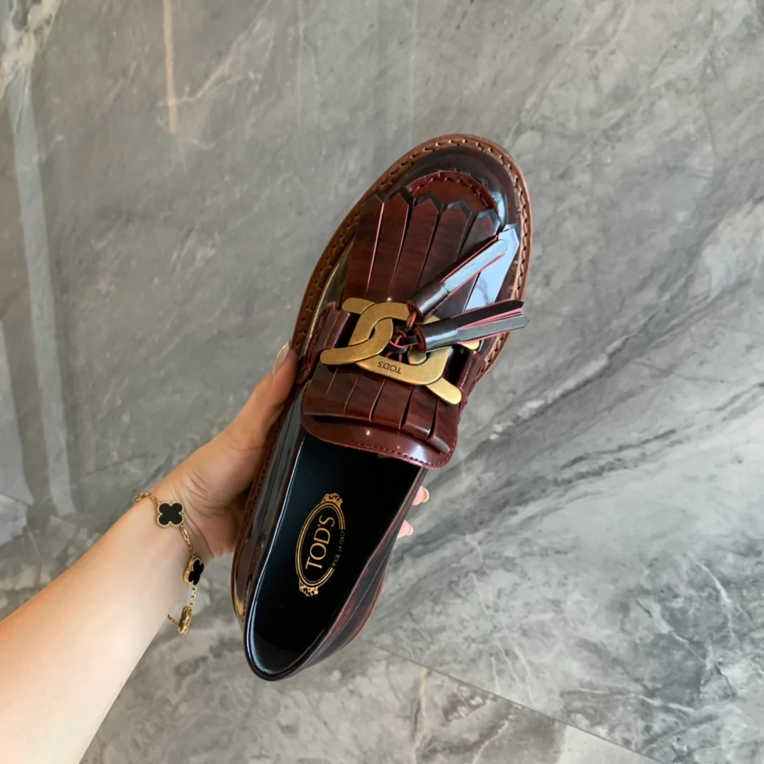 Лоферы Tods на платформе с кисточками - 1