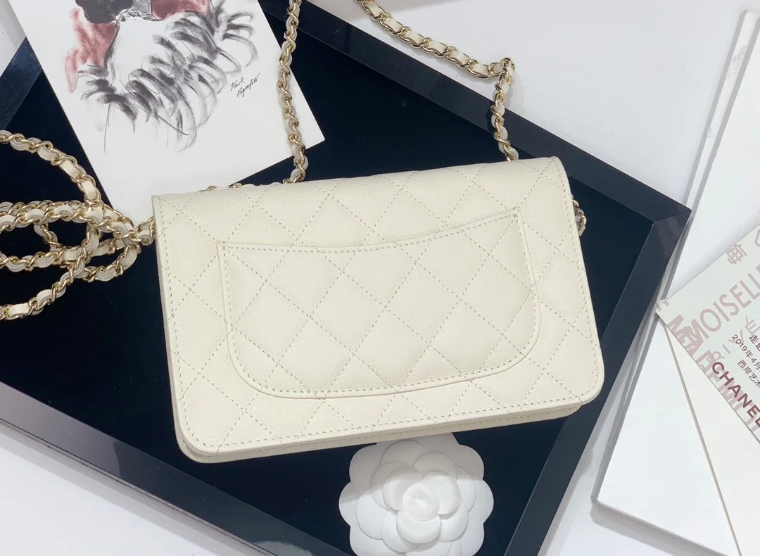 Пряжка Chanel WOC с узором ?Кунжут? из светлого золота - 2 шт.