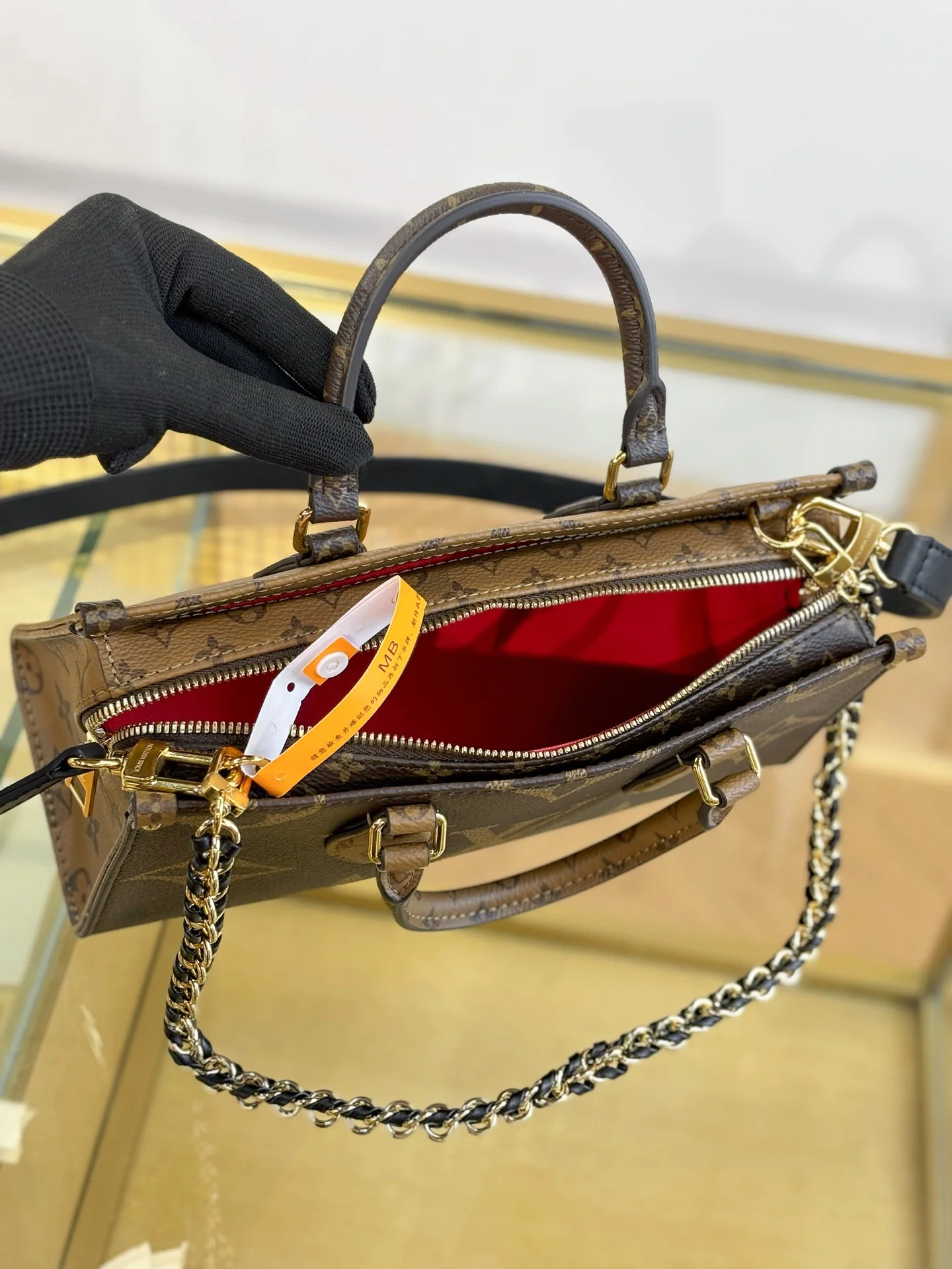 LV-mb163c-onthego-east-west-chain-handbag-classic monogram