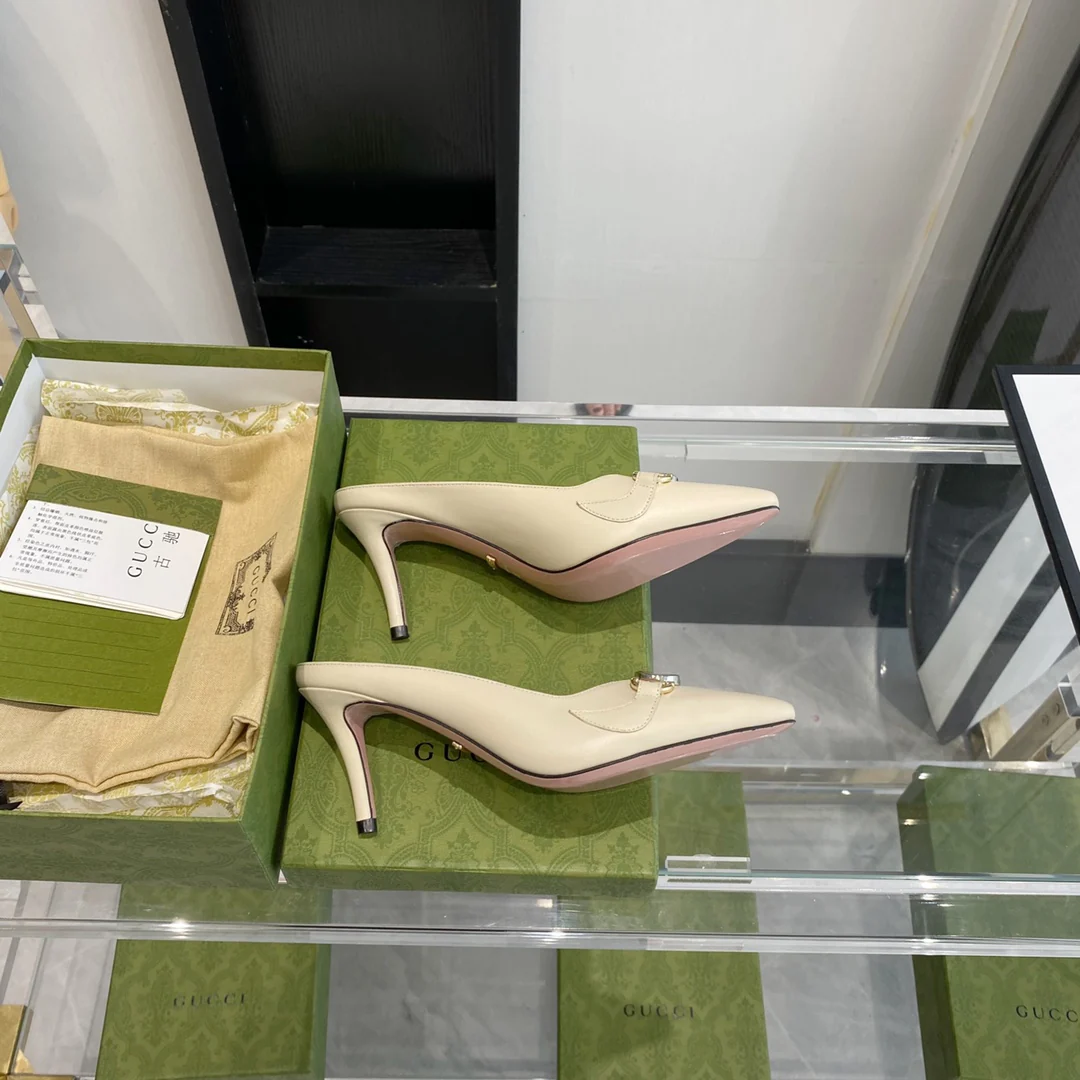 Мюли Gucci с острым носком на низком каблуке