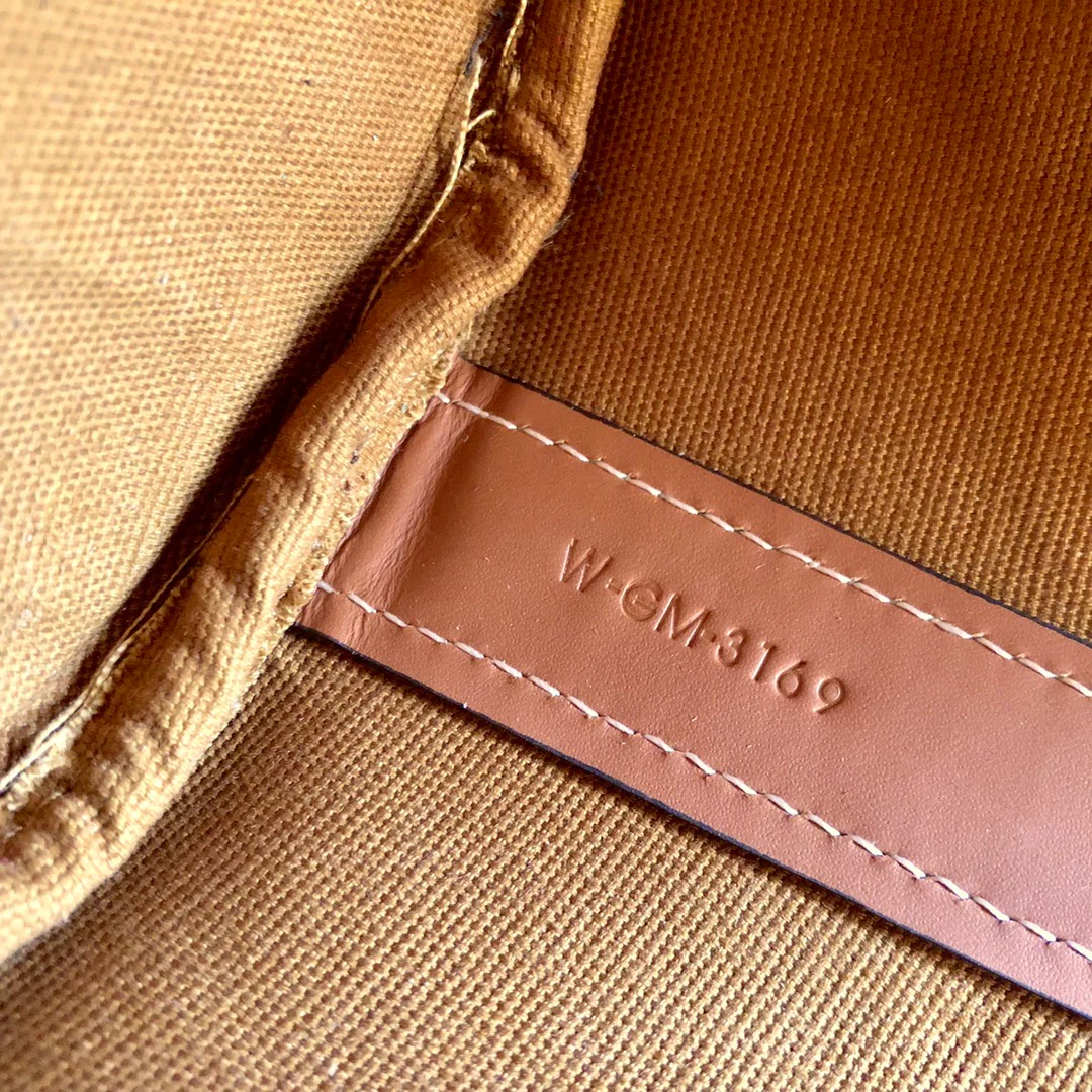 Маленькая холщовая сумка Celine Triomphe на завязках - желто-коричневая с монограммой.