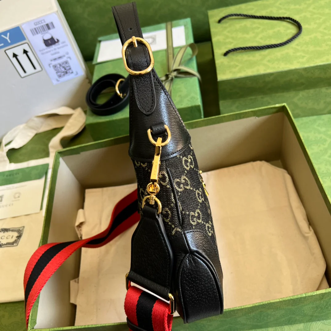 Джинсы Gucci Jackie 1961 из черного денима.