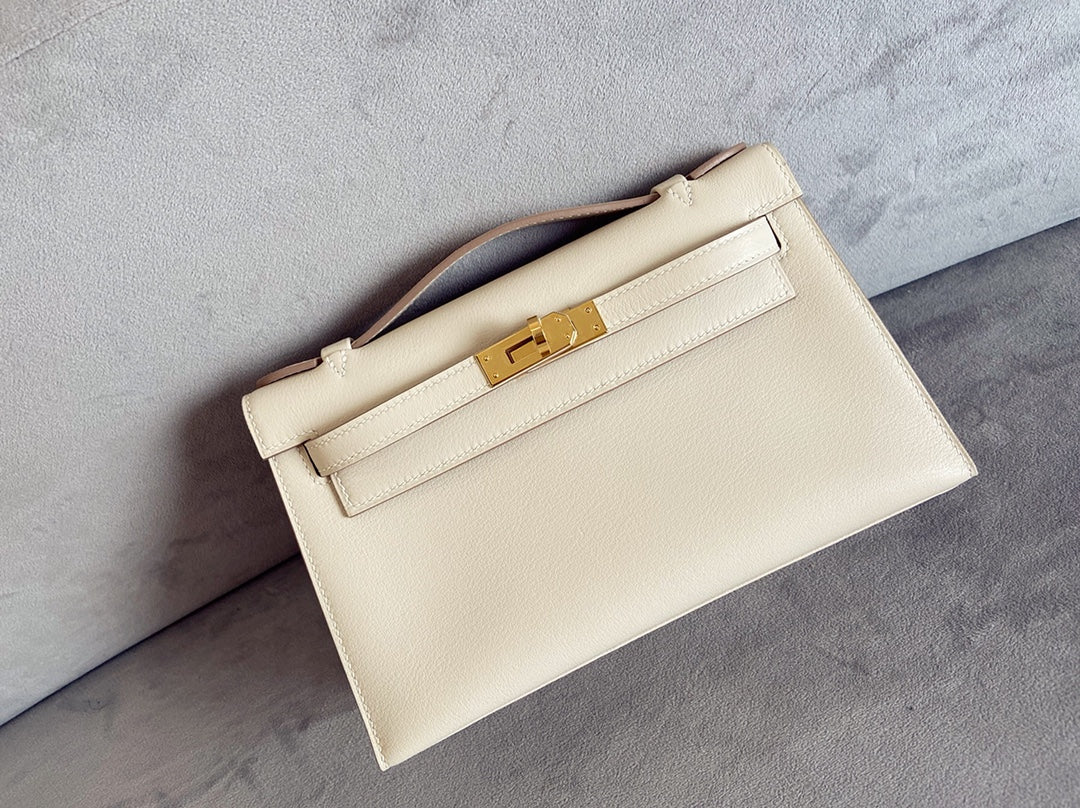 Сумка Hermes Mini Kelly 1-го поколения, 22 см, из кожи Swift, цвет Nutshade, фурнитура из белого золота.
