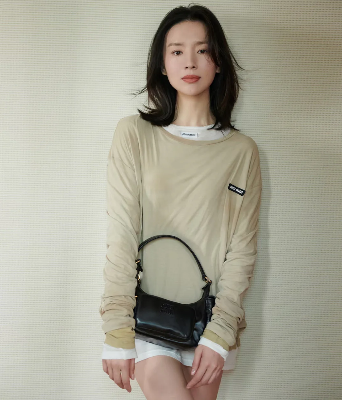 Сумка Miu Miu из кожи наппа с карманами — носите и делитесь с другими.