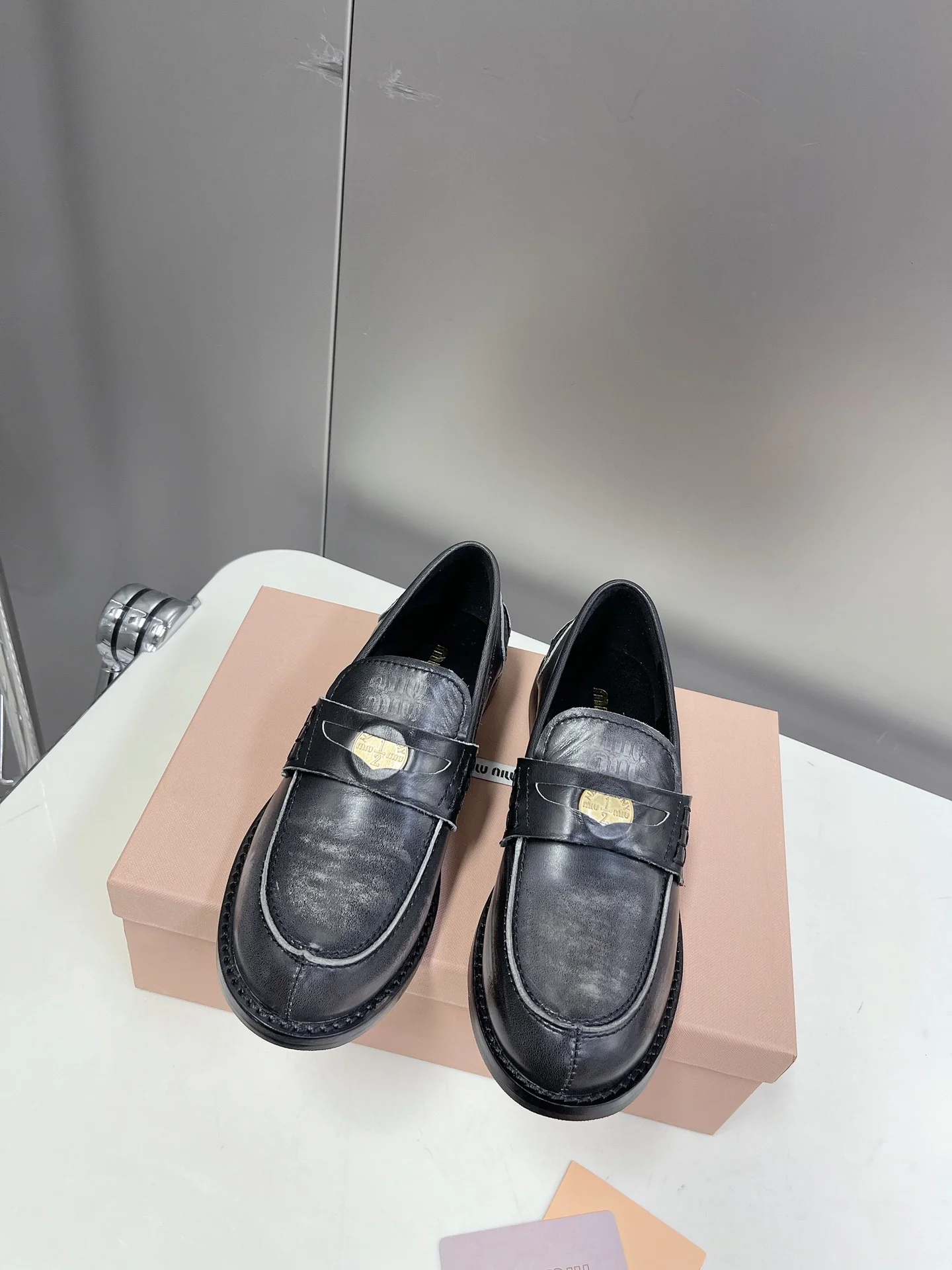 Лоферы Miu Miu Coin - черные