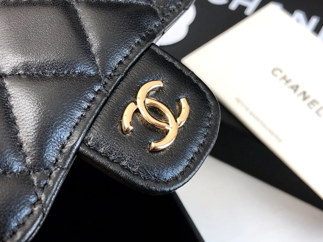 Мини-сумочка Chanel с ручкой - черная