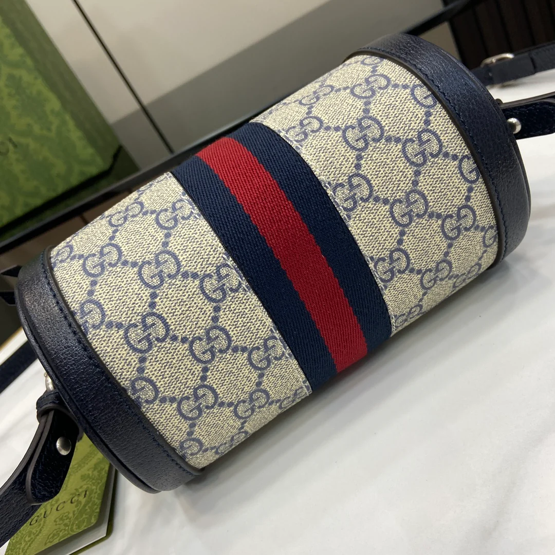 Миниатюрная цилиндрическая сумка Gucci Ophidia - с черной отделкой.