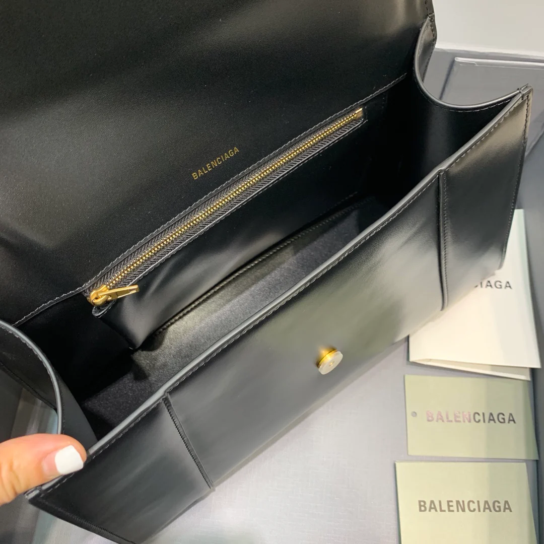 Сумка Balenciaga Hourglass (большая) - черная, однотонная кожа.