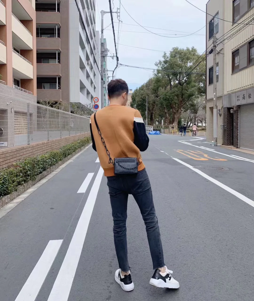 m44735-LV-mini-soft-trunk-on-body photo