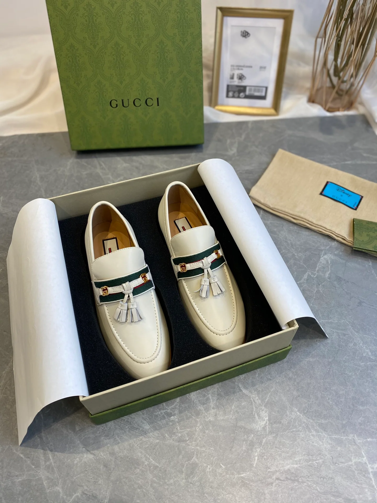 Лоферы Gucci с кисточками