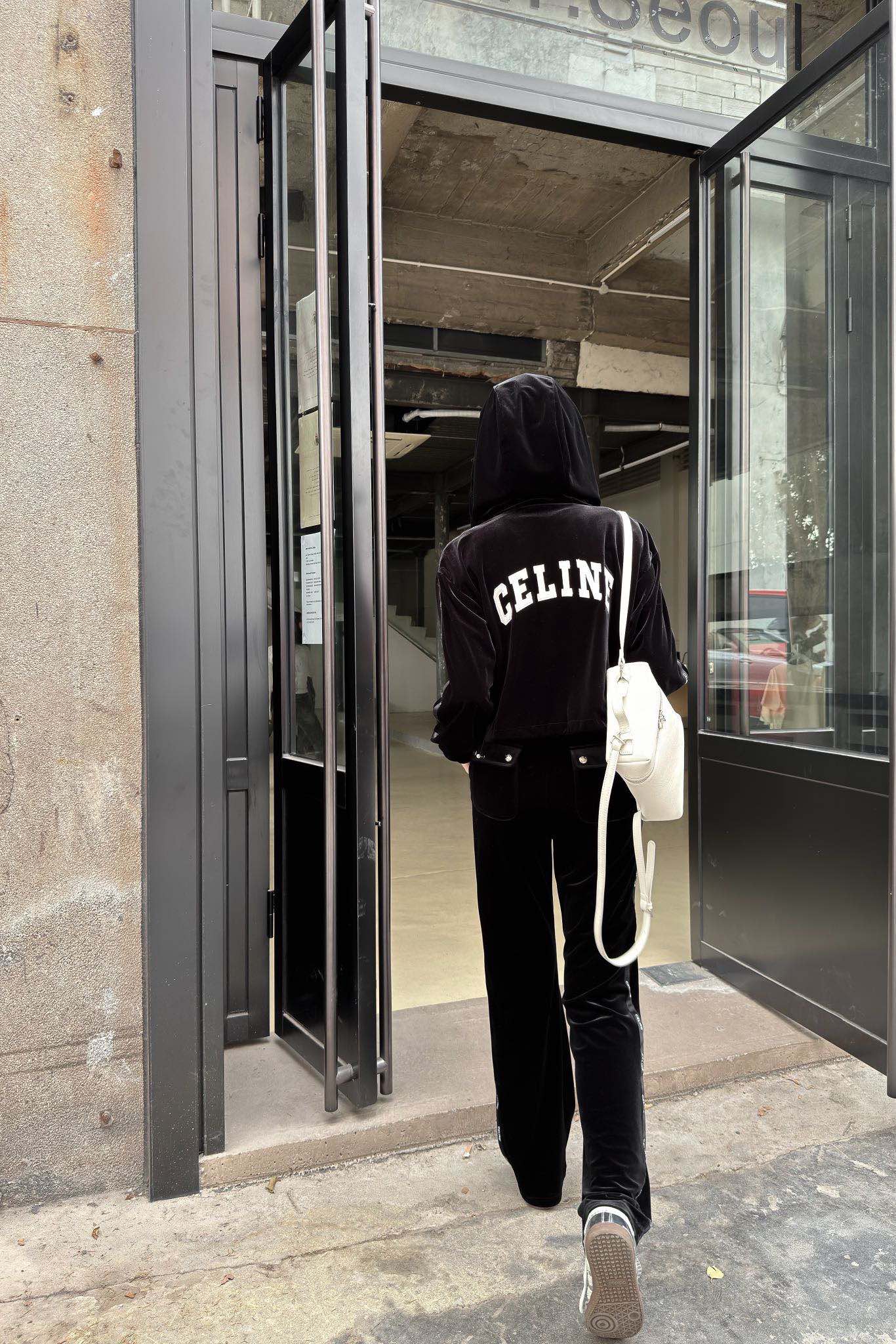 Celine-2403 - Куртка с капюшоном на молнии, эластичным поясом и широкие брюки.